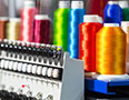 Custom embroidery machine with thread